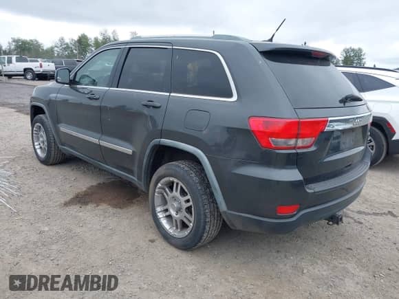 2011 Jeep Grand Cherokee 70th Anniversary with VIN 1J4RR4GG3BC582470, listed as a IAAI auction lot 42138291 with 241,429 mi miles and . Bid and sale history available at DreamBid. Image 3.