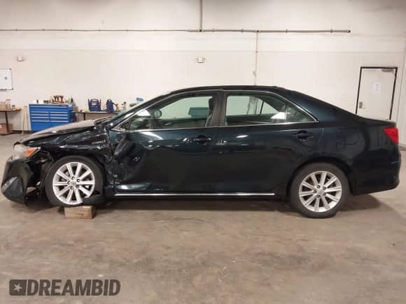 2013 Toyota Camry XLE with VIN 4T1BD1FK5DU097069, listed as a IAAI auction lot 43052279 with 90,257 mi miles and . Bid and sale history available at DreamBid. Image 14.