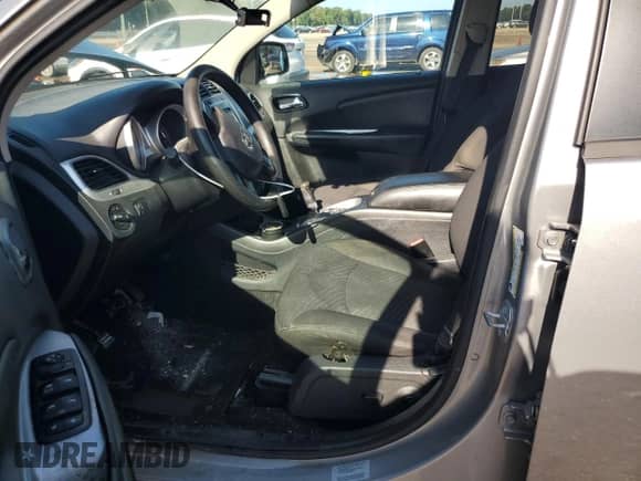 2017 Dodge Journey SXT with VIN 3C4PDDBG6HT574072, listed as a Copart auction lot 68840345 with 173,502 mi miles and Salvage title. Bid and sale history available at DreamBid. Image 7.