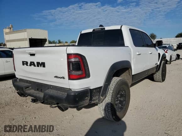 2022 Ram 1500 TRX с VIN 1C6SRFU91NN252416, выставлен на аукционе Copart как лот 85870095 с пробегом 64 500 миль миль и Списание • Salvage title. История ставок и продаж доступна на DreamBid. Изображение 3.