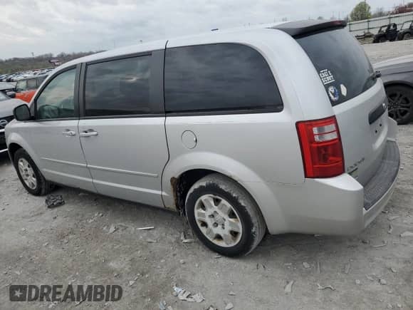 2010 Dodge Grand Caravan SE with VIN 2D4RN4DE9AR443389, listed as a Copart auction lot 57223315 with 379,870 mi miles and Salvage title. Bid and sale history available at DreamBid. Image 2.