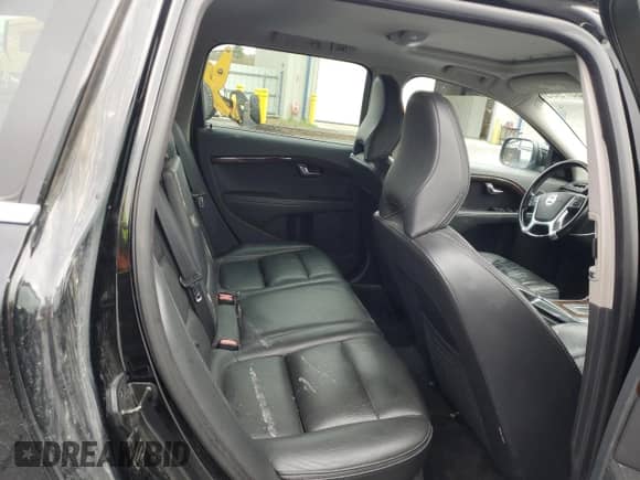 2012 Volvo XC70 3.2L z VIN YV4940BZ8C1138873, wystawiony jako Copart lot #55557985 z przebiegiem 212 651 mil mil oraz Szkoda całkowita • Salvage title. Historia ofert i sprzedaży dostępna na DreamBid. Obrazek 11.