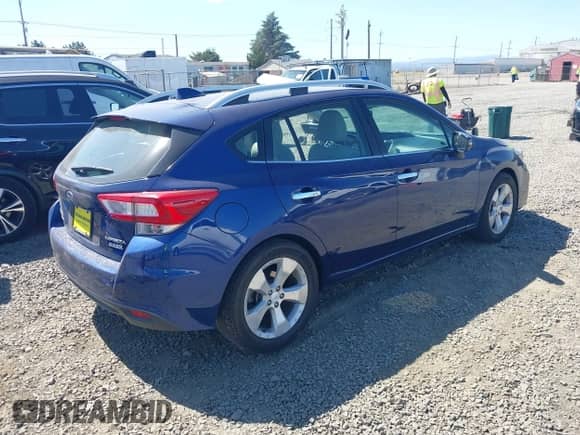 2017 Subaru Impreza Limited with VIN 4S3GTAU62H3740153, listed as a IAAI auction lot 42983003 with 122,074 mi miles and . Bid and sale history available at DreamBid. Image 4.