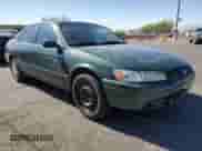 1999 Toyota Camry LE z VIN JT2BG28KXX0359137, wystawiony jako Copart lot #85011045 z przebiegiem 158 951 mil mil oraz Czysty tytuł • Clean title. Historia ofert i sprzedaży dostępna na DreamBid. Obrazek 4.