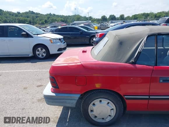 1991 Dodge Shadow with VIN 3B3XP45K8MT603753, listed as a IAAI auction lot 42957931 with 130,805 mi miles and . Bid and sale history available at DreamBid. Image 16.