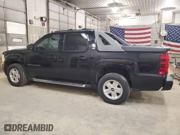 2009 Chevrolet Avalanche 1LT with VIN 3GNEC22J99G179847, listed as a Copart auction lot 52622615 with 153,437 mi miles and Salvage title. Bid and sale history available at DreamBid. Image 2.