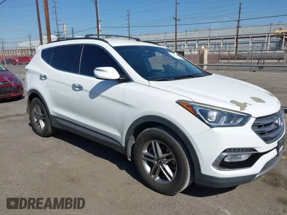 2018 Hyundai Santa Fe 2.4L with VIN 5NMZU3LB6JH057170, listed as a IAAI auction lot 43126111 with 89,888 mi miles and . Bid and sale history available at DreamBid. Image 1.