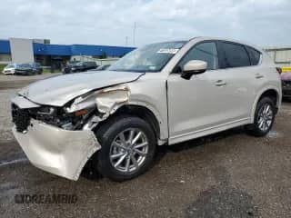 2024 Mazda CX-5 S Select z VIN JM3KFBBLXR0442220, wystawiony jako Copart lot #71835095 z przebiegiem Nie podano mil oraz Nie do naprawy • Non repairable. Historia ofert i sprzedaży dostępna na DreamBid. Obrazek 1.