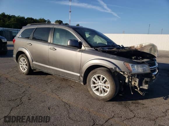 2013 Dodge Journey SXT with VIN 3C4PDCBB5DT521081, listed as a Copart auction lot 71712545 with Not provided miles and Salvage title. Bid and sale history available at DreamBid. Image 4.