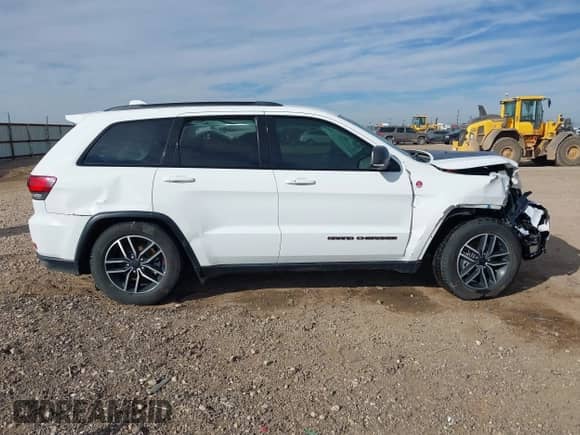 2019 Jeep Grand Cherokee Trailhawk z VIN 1C4RJFLG7KC726830, wystawiony jako IAAI lot #41448850 z przebiegiem 97 218 mil mil oraz . Historia ofert i sprzedaży dostępna na DreamBid. Obrazek 13.