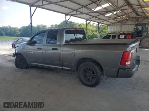 2011 Ram 1500 ST with VIN 1D7RB1GKXBS703861, listed as a Copart auction lot 63916905 with 175,564 mi miles and Salvage title. Bid and sale history available at DreamBid. Image 2.