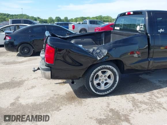 2005 Dodge Dakota SLT with VIN 1D7HW42N25S177569, listed as a IAAI auction lot 42327252 with 88,259 mi miles and . Bid and sale history available at DreamBid. Image 6.
