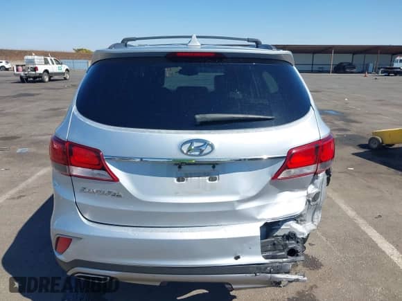 2018 Hyundai Santa Fe SE z VIN KM8SM4HFXJU261140, wystawiony jako IAAI lot #43258957 z przebiegiem 98 636 mil mil oraz . Historia ofert i sprzedaży dostępna na DreamBid. Obrazek 16.