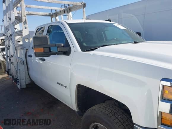 2019 Chevrolet Silverado 2500HD Work Truck z VIN 2GC2CREG8K1171872, wystawiony jako IAAI lot #43163676 z przebiegiem 197 775 mil mil oraz . Historia ofert i sprzedaży dostępna na DreamBid. Obrazek 13.