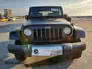2008 Jeep Wrangler Sahara с VIN 1J8FA54158L589606, выставлен на аукционе Copart как лот 82117285 с пробегом 143 741 миль миль и Чистый • Clean title. История ставок и продаж доступна на DreamBid. Изображение 5.