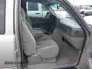 2004 Chevrolet Tahoe LT with VIN 1GNEC13Z04R203993, listed as a IAAI auction lot 42468158 with 233,657 mi miles and . Bid and sale history available at DreamBid. Image 5.