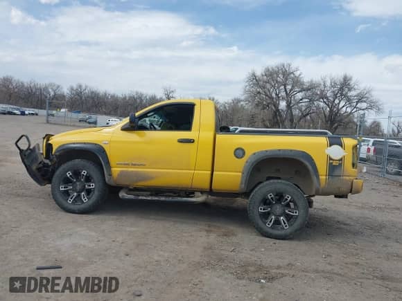 2005 Dodge 1500 SLT z VIN 1D7HU16D55J534948, wystawiony jako IAAI lot #42017793 z przebiegiem 208 999 mil mil oraz . Historia ofert i sprzedaży dostępna na DreamBid. Obrazek 14.