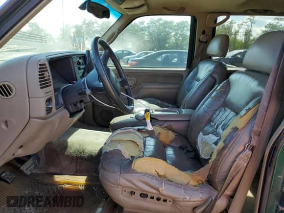 1999 Chevrolet Tahoe с VIN 1GNEK13R1XJ380090, выставлен на аукционе Copart как лот 71499445 с пробегом 235 993 миль миль и Списание • Salvage title. История ставок и продаж доступна на DreamBid. Изображение 7.