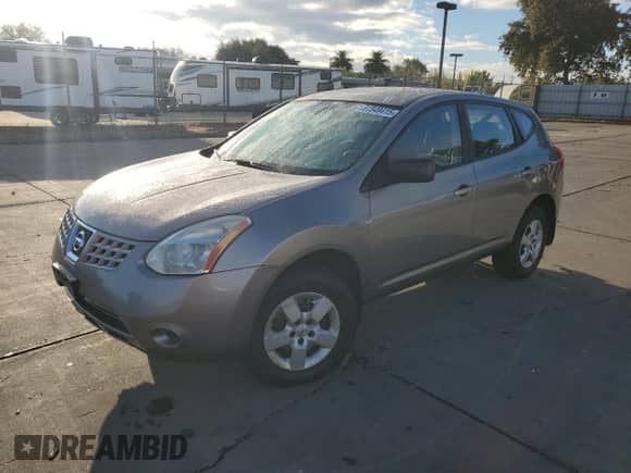 2009 Nissan Rogue S with VIN JN8AS58V99W183165, listed as a Copart auction lot 81949415 with 87,942 mi miles and Salvage title. Bid and sale history available at DreamBid. Image 1.