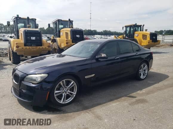 2011 BMW 7 Series 750i with VIN WBAKA8C58BCY36925, listed as a Copart auction lot 69639325 with 143,247 mi miles and Salvage title. Bid and sale history available at DreamBid. Image 1.