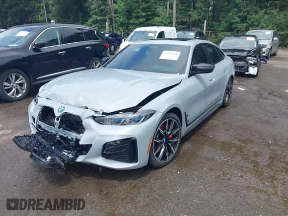 2023 BMW i4 M50 with VIN WBY33AW0XPFP05542, listed as a IAAI auction lot 43029006 with 12,709 mi miles and . Bid and sale history available at DreamBid. Image 19.