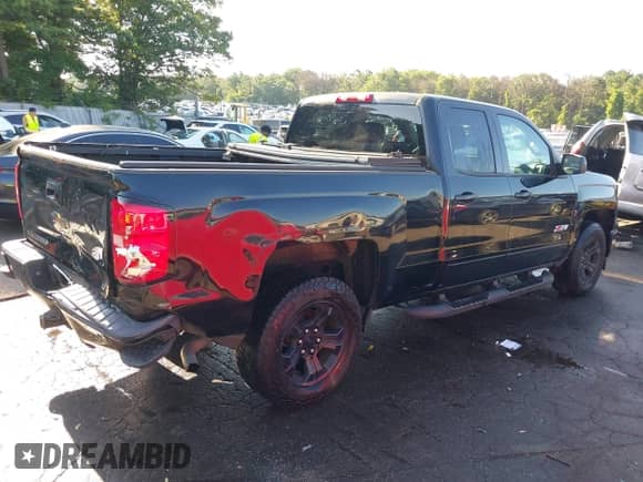 2015 Chevrolet Silverado 1500 LT with VIN 1GCVKREC1FZ332881, listed as a IAAI auction lot 42744439 with 124,409 mi miles and . Bid and sale history available at DreamBid. Image 4.