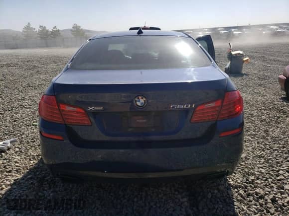 2016 BMW 5 Series 550i xDrive with VIN WBAKP9C5XGG587547, listed as a Copart auction lot 52205225 with 83,959 mi miles and Salvage title. Bid and sale history available at DreamBid. Image 6.