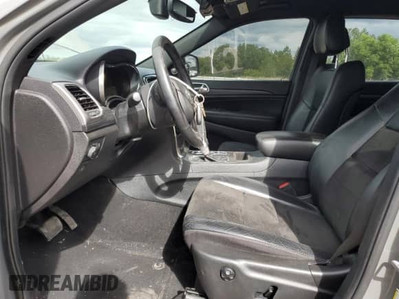 2020 Jeep Grand Cherokee Altitude with VIN 1C4RJFAG9LC179869, listed as a Copart auction lot 70151515 with 83,688 mi miles and Salvage title. Bid and sale history available at DreamBid. Image 7.