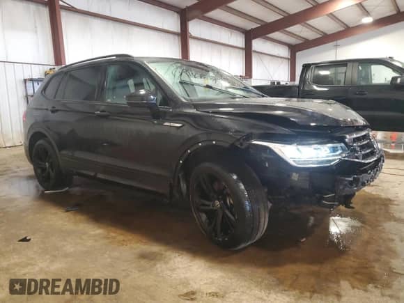 2023 Volkswagen Tiguan SE R-Line Black с VIN 3VVCB7AX2PM059426, выставлен на аукционе Copart как лот 67071615 с пробегом 98 192 миль миль и Списание • Salvage title. История ставок и продаж доступна на DreamBid. Изображение 4.