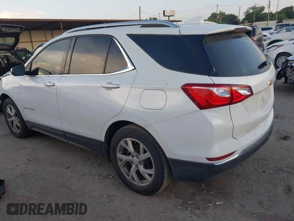 2018 Chevrolet Equinox Premier with VIN 3GNAXMEV8JS634895, listed as a IAAI auction lot 43076870 with 129,376 mi miles and . Bid and sale history available at DreamBid. Image 3.