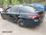 2021 Toyota Camry SE Nightshade z VIN 4T1T11AK9MU430894, wystawiony jako IAAI lot #43127250 z przebiegiem 80 059 mil mil oraz . Historia ofert i sprzedaży dostępna na DreamBid. Obrazek 3.