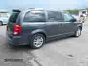2018 Dodge Grand Caravan SXT with VIN 2C4RDGCGXJR173545, listed as a IAAI auction lot 43315815 with 40,978 mi miles and . Bid and sale history available at DreamBid. Image 4.