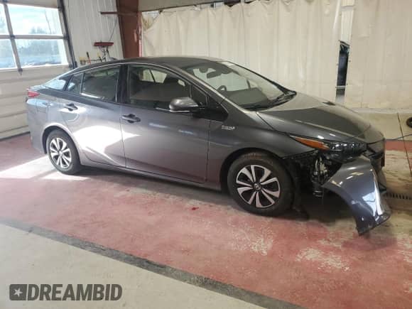 2018 Toyota Prius Plus with VIN JTDKARFP0J3094010, listed as a Copart auction lot 82364905 with 134,611 mi miles and Salvage title. Bid and sale history available at DreamBid. Image 4.