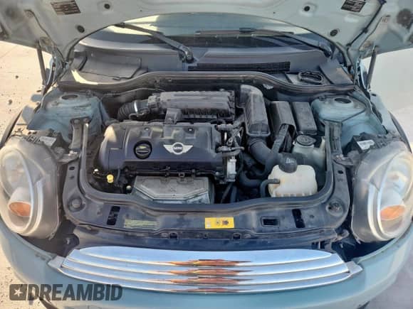 2013 MINI Hardtop with VIN WMWSU3C5XDT692050, listed as a Copart auction lot 61934885 with 117,209 mi miles and Clean title. Bid and sale history available at DreamBid. Image 11.