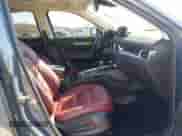 2022 Mazda CX-5 S Carbon Edition z VIN JM3KFBCMXN1619568, wystawiony jako IAAI lot #41828567 z przebiegiem 41 475 mil mil oraz . Historia ofert i sprzedaży dostępna na DreamBid. Obrazek 5.
