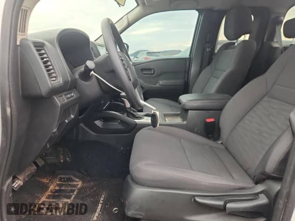 2024 Nissan Frontier S with VIN 1N6ED1CL1RN669400, listed as a Copart auction lot 84985035 with 10,810 mi miles and Salvage title. Bid and sale history available at DreamBid. Image 7.
