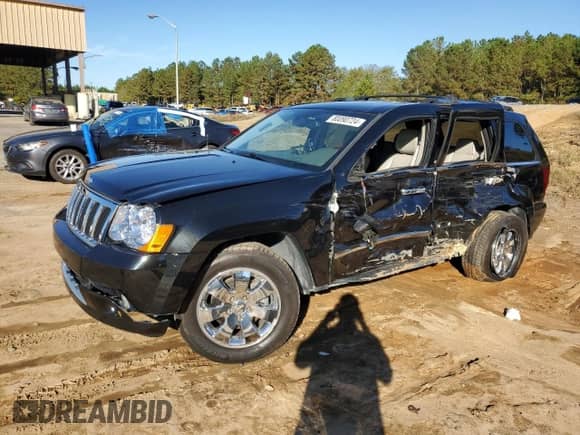 2009 Jeep Grand Cherokee with VIN 1J8HR68T19C550936, listed as a Copart auction lot 80090724 with 113,543 mi miles and Salvage title. Bid and sale history available at DreamBid. Image 1.