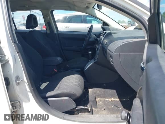 2008 Dodge Caliber SE with VIN 1B3HB28B58D693197, listed as a IAAI auction lot 42754484 with 92,124 mi miles and . Bid and sale history available at DreamBid. Image 5.