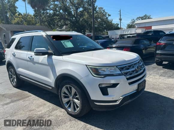 2019 Ford Explorer Limited z VIN 1FM5K8F80KGA52780, wystawiony jako Copart lot #90130305 z przebiegiem 131 865 mil mil oraz Czysty tytuł • Clean title. Historia ofert i sprzedaży dostępna na DreamBid. Obrazek 1.