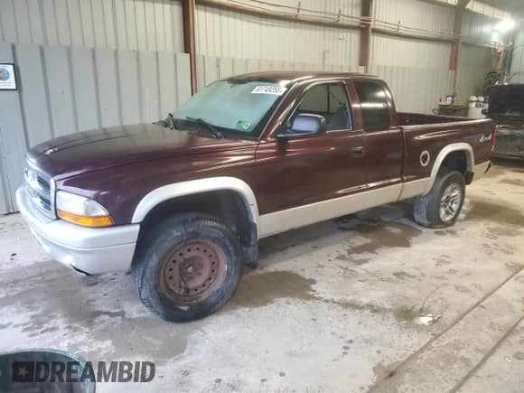 2004 Dodge Dakota SLT с VIN 1D7HG42N24S677145, выставлен на аукционе Copart как лот 81749255 с пробегом Не указан миль и Чистый • Clean title. История ставок и продаж доступна на DreamBid. Изображение 1.