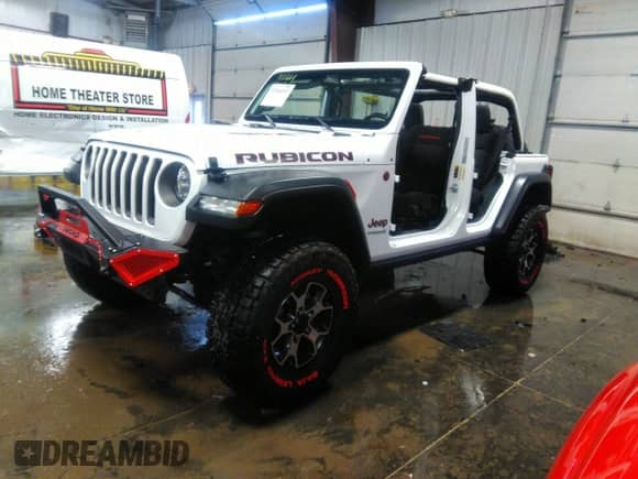 2021 Jeep Wrangler Unlimited Rubicon with VIN 1C4HJXFN9MW779882, listed as a IAAI auction lot 37264183 with 36,314 mi miles and . Bid and sale history available at DreamBid. Image 2.