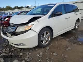 2012 Honda Odyssey Touring с VIN 5FNRL5H90CB015845, выставлен на аукционе Copart как лот 86663335 с пробегом 189 468 миль миль и Списание • Salvage title. История ставок и продаж доступна на DreamBid. Изображение 1.