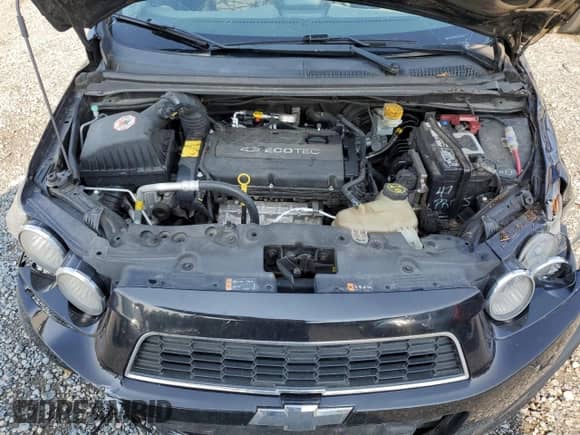 2012 Chevrolet Sonic LT z VIN 1G1JD6SH5C4175509, wystawiony jako Copart lot #61693745 z przebiegiem 182 462 mil mil oraz Szkoda całkowita • Salvage title. Historia ofert i sprzedaży dostępna na DreamBid. Obrazek 11.