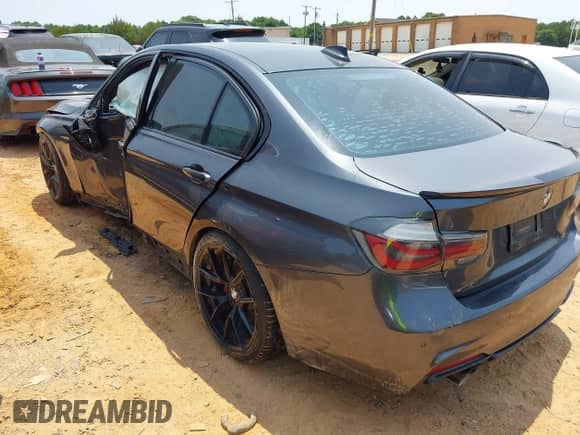 2014 BMW 3 Series 335i with VIN WBA3A9G53ENS65535, listed as a IAAI auction lot 42399152 with 142,559 mi miles and . Bid and sale history available at DreamBid. Image 3.