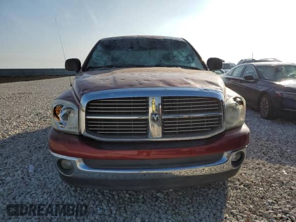 2007 Dodge 1500 SLT z VIN 1D7HA18267S169441, wystawiony jako Copart lot #70528583 z przebiegiem 208 882 mil mil oraz Czysty tytuł • Clean title. Historia ofert i sprzedaży dostępna na DreamBid. Obrazek 5.