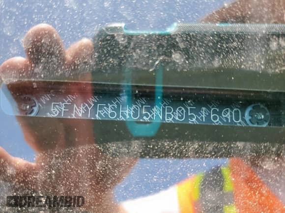 2022 Honda Pilot Elite z VIN 5FNYF6H05NB051690, wystawiony jako Copart lot #61207015 z przebiegiem 33 105 mil mil oraz Szkoda całkowita • Salvage title. Historia ofert i sprzedaży dostępna na DreamBid. Obrazek 14.