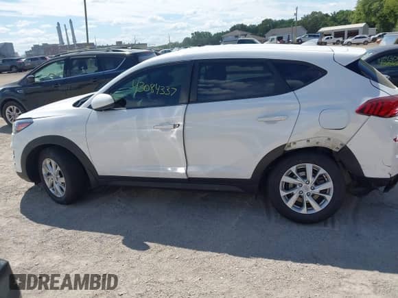 2020 Hyundai Tucson SE with VIN KM8J2CA43LU218315, listed as a IAAI auction lot 43084337 with 32,108 mi miles and . Bid and sale history available at DreamBid. Image 14.