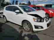 2016 Chevrolet Sonic LT with VIN 1G1JC6SG9G4155828, listed as a Copart auction lot 81158495 with 81,883 mi miles and Salvage title. Bid and sale history available at DreamBid. Image 4.