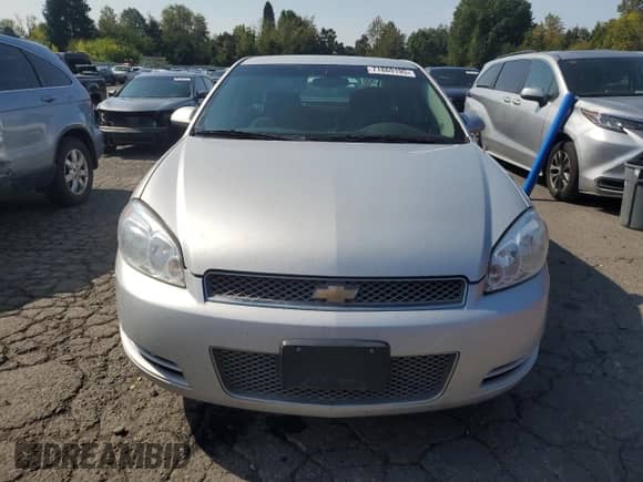 2013 Chevrolet Impala LT z VIN 2G1WG5E3XD1258762, wystawiony jako Copart lot #71869195 z przebiegiem 215 055 mil mil oraz Szkoda całkowita • Salvage title. Historia ofert i sprzedaży dostępna na DreamBid. Obrazek 5.