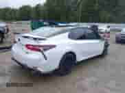 2023 Toyota Camry TRD with VIN 4T1KZ1AKXPU082161, listed as a IAAI auction lot 43388188 with 42,868 mi miles and . Bid and sale history available at DreamBid. Image 4.